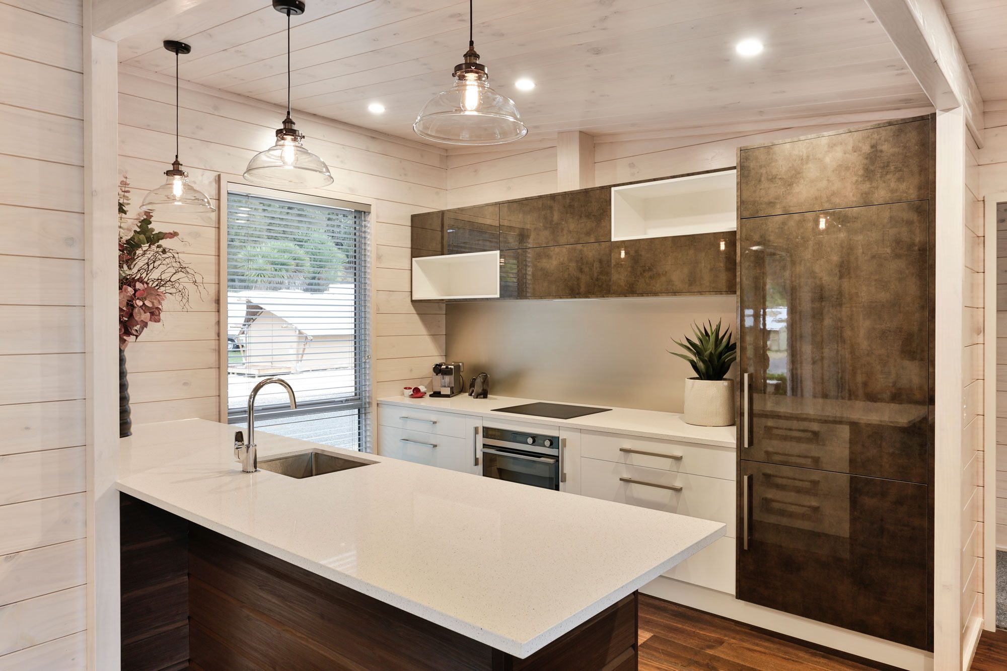 Pared back brushed steel look splashback