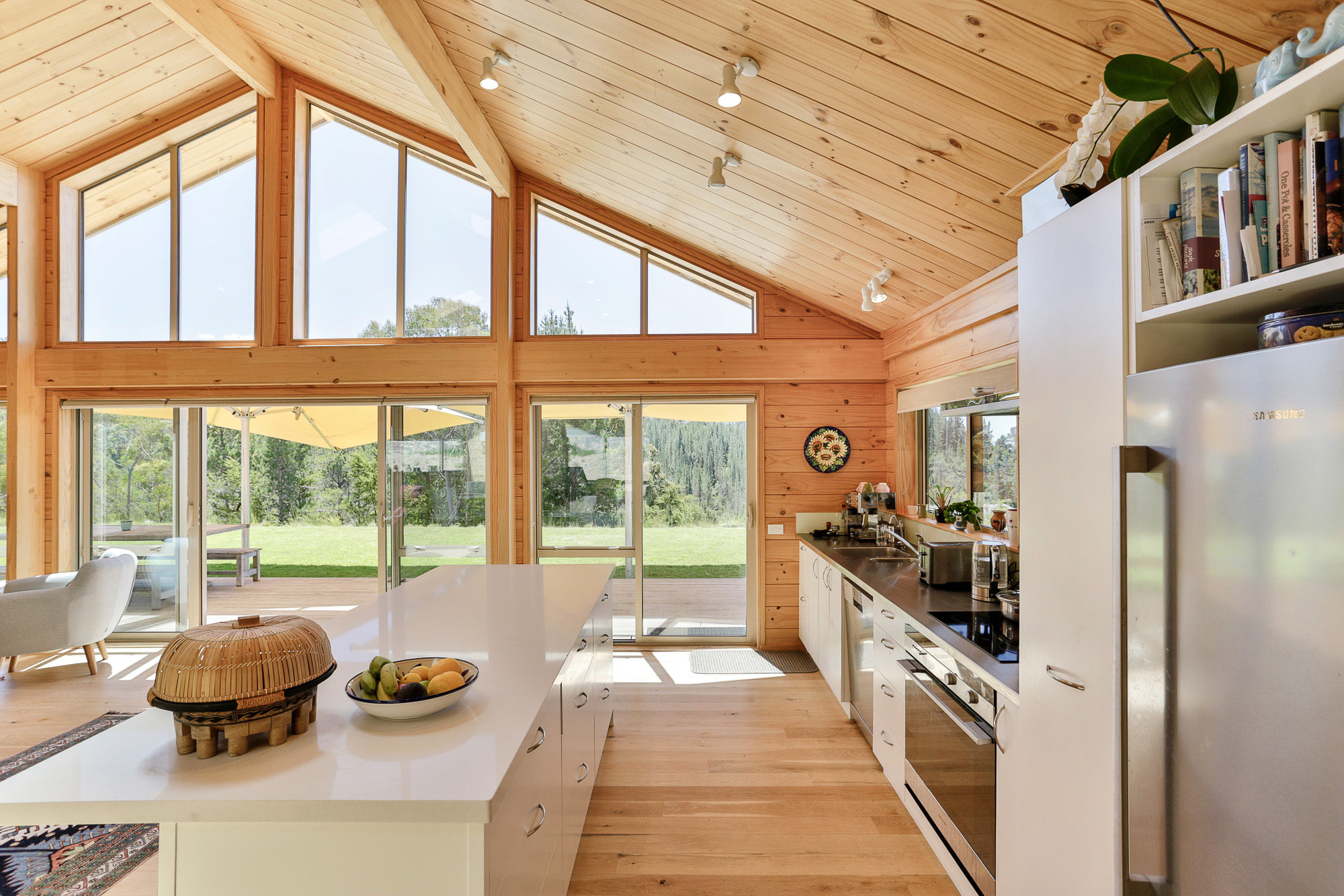 Lockwood Kaiteriteri home with timber portals and large gabled windows