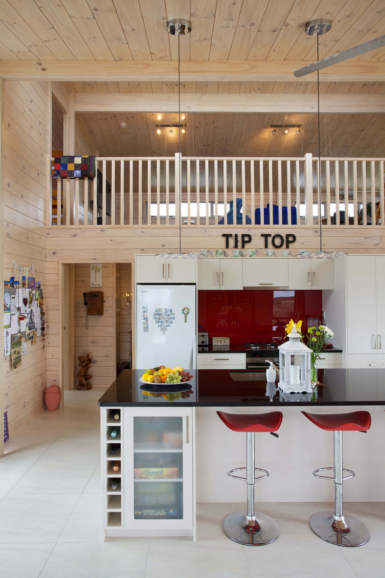 Deep red splashback in Lockwood kitchen