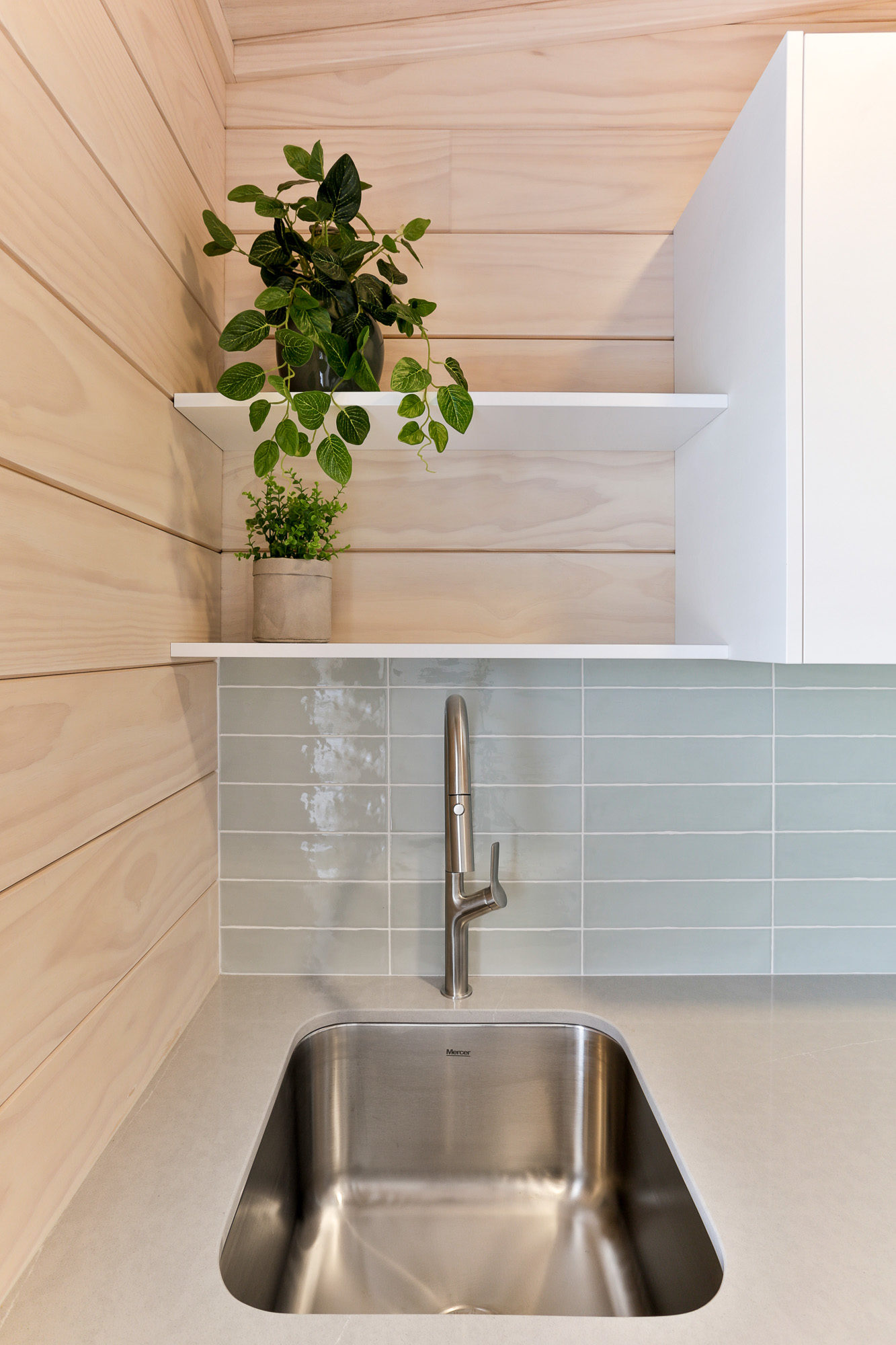 Stunning pale blue subway tiles in the Lockwood Al-fresco home in Wellington
