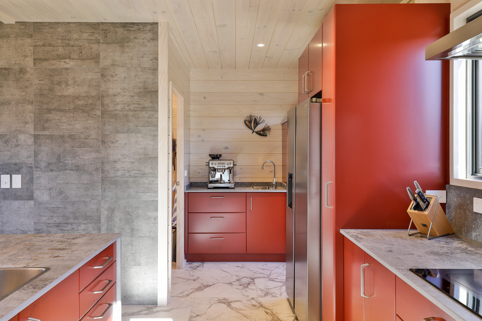Coloured joinery adds pop of colour to Lockwood home
